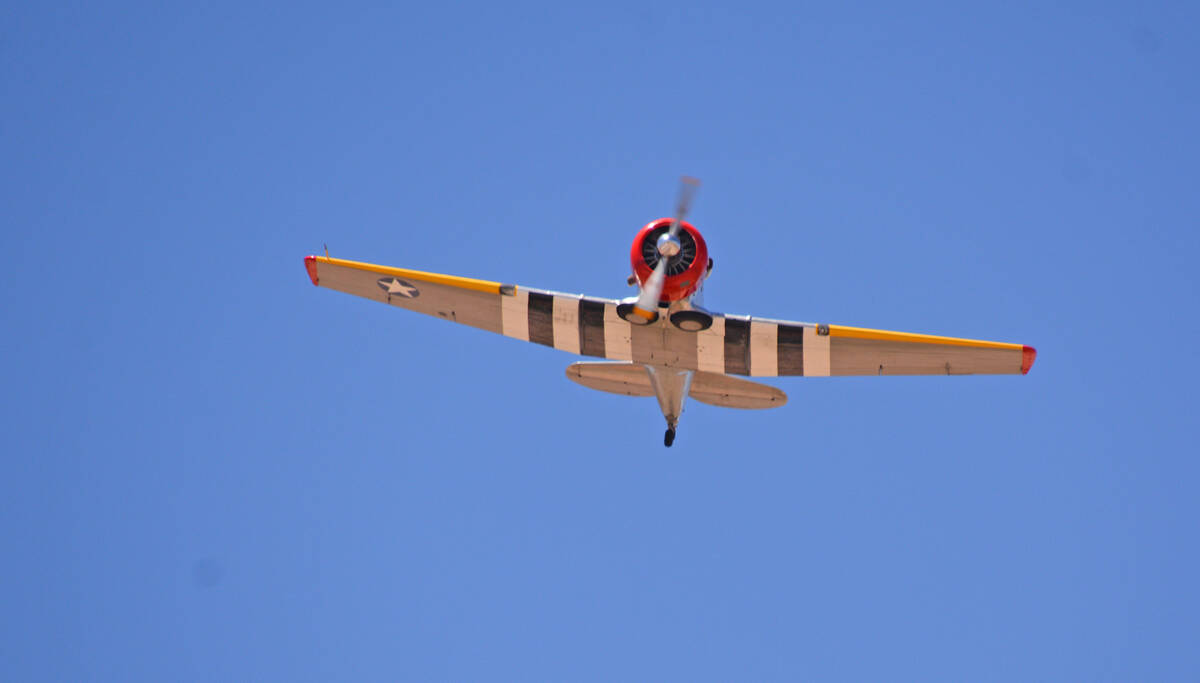 Celia Shortt Goodyear/Boulder City Review A T-6 Texan flies over the Southern Nevada Veterans M ...