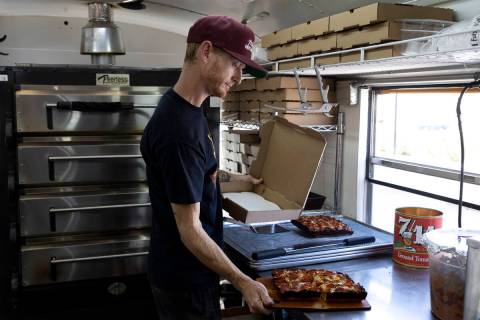 (Ellen Schmidt/Las Vegas Review-Journal) Chef Brett Geiger boxes a Detroit-style pizza at his f ...