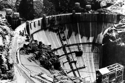 (AP Photo) This aerial view shows a crest of the Hoover Dam, aka Boulder Dam, showing the highw ...