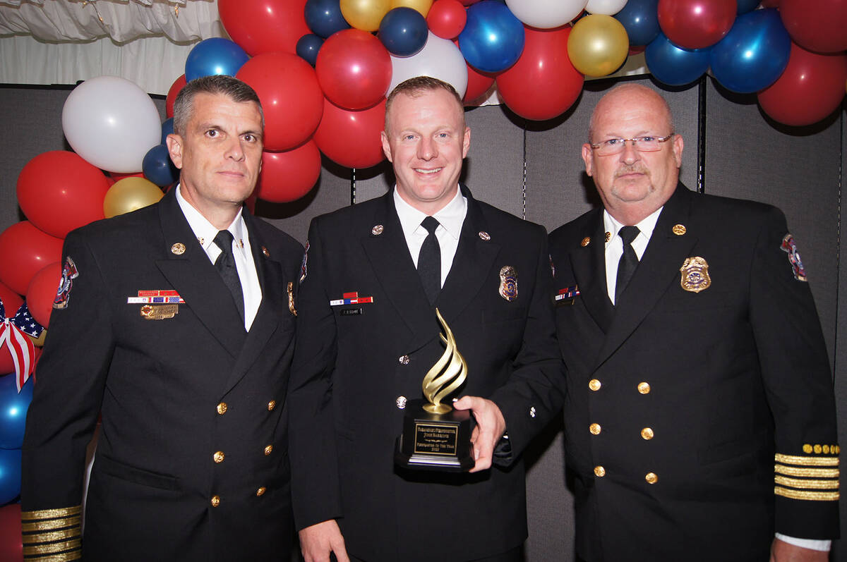 (Photo courtesy Boulder City) Boulder City Firefighter Joshua Barrone, center, was named firefi ...