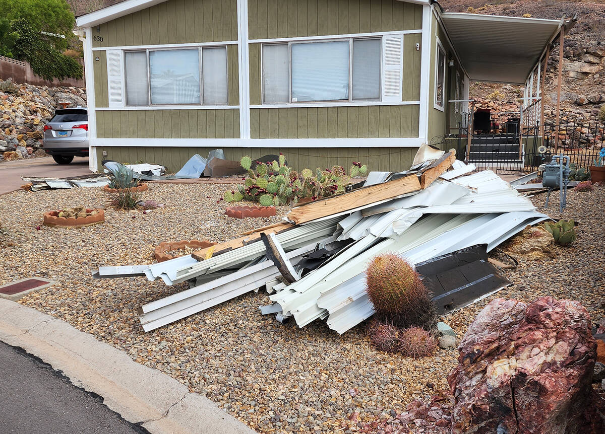 (Photo courtesy Lake Mountain Estates Homeowners Association) Debris from a neighbor’s patio ...