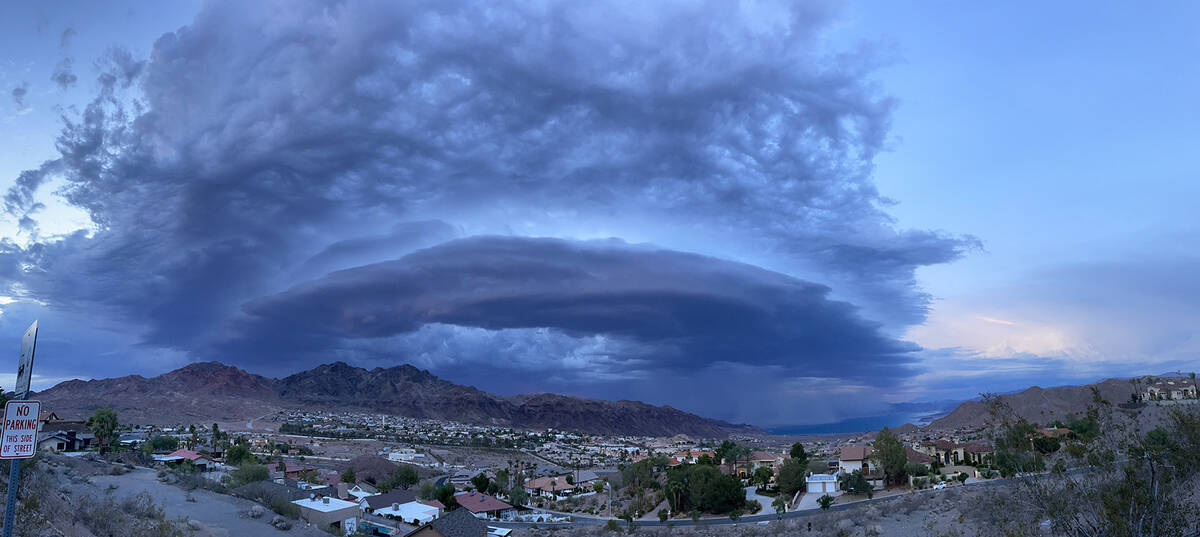 (Photo courtesy Candace Bartsch) The approaching thunderstorm July 28, can be seen hovering ove ...