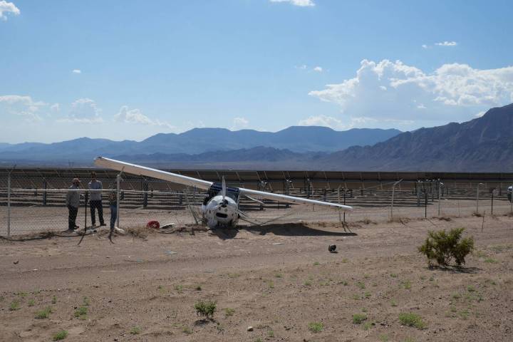 (Owen Krepps/Boulder City Review) A two-person plane crashed along Interstate 11 on Friday, Aug ...