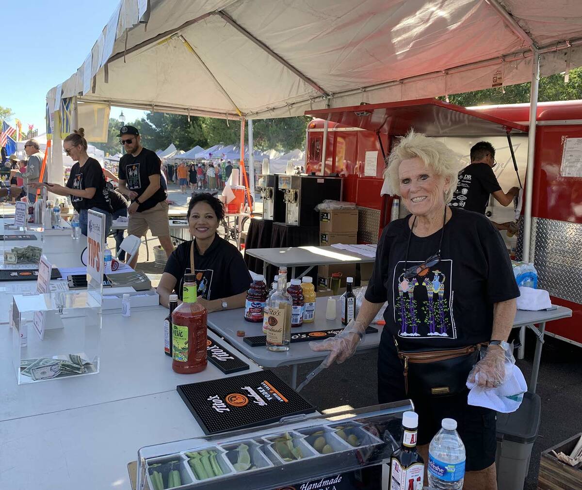 (Hali Bernstein Saylor/Boulder City Review) Among those working in the beer booth to help raise ...