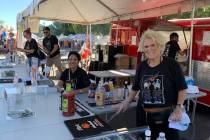 (Hali Bernstein Saylor/Boulder City Review) Among those working in the beer booth to help raise ...