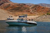(L.E. Baskow/Las Vegas Review-Journal) A boat cruises past the Kingman Wash area within the Lak ...