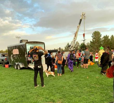 (Anisa Buttar/Boulder City Review) Attendees look at "The Nightmare Before Christmas" Trunk or ...