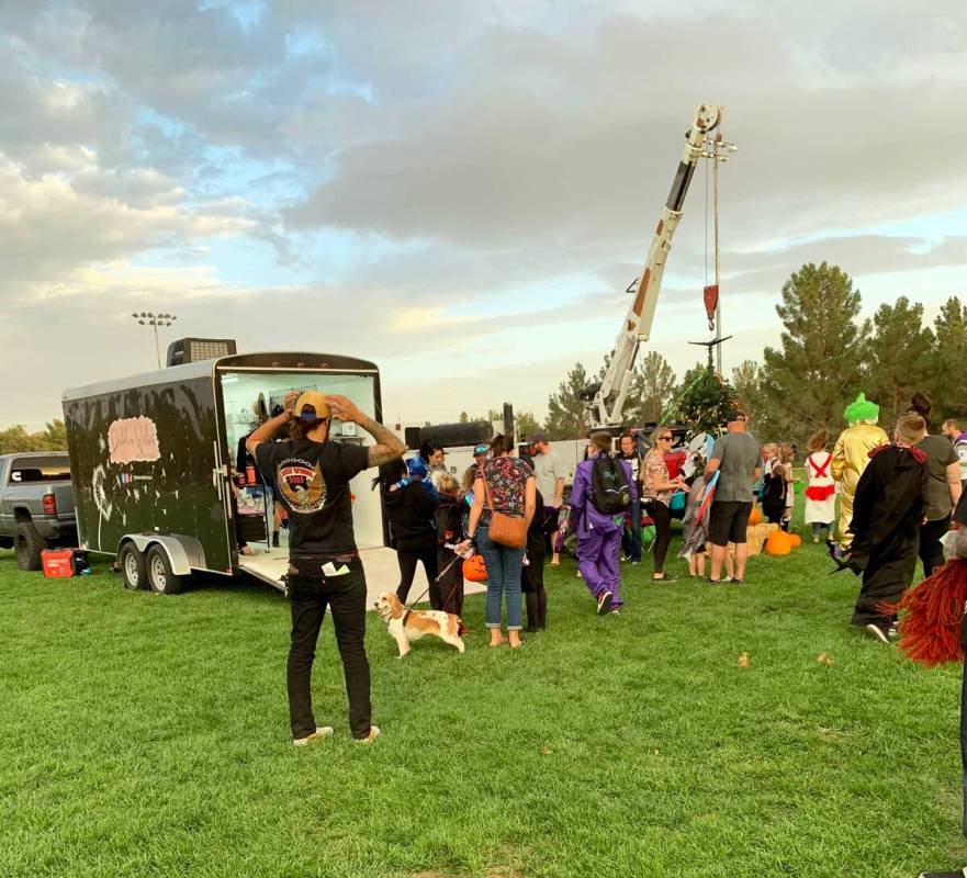 (Anisa Buttar/Boulder City Review) Attendees look at "The Nightmare Before Christmas" Trunk or ...