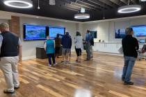 (Anisa Buttar/Boulder City Review) Boulder City residents viewed educational diagrams about the ...