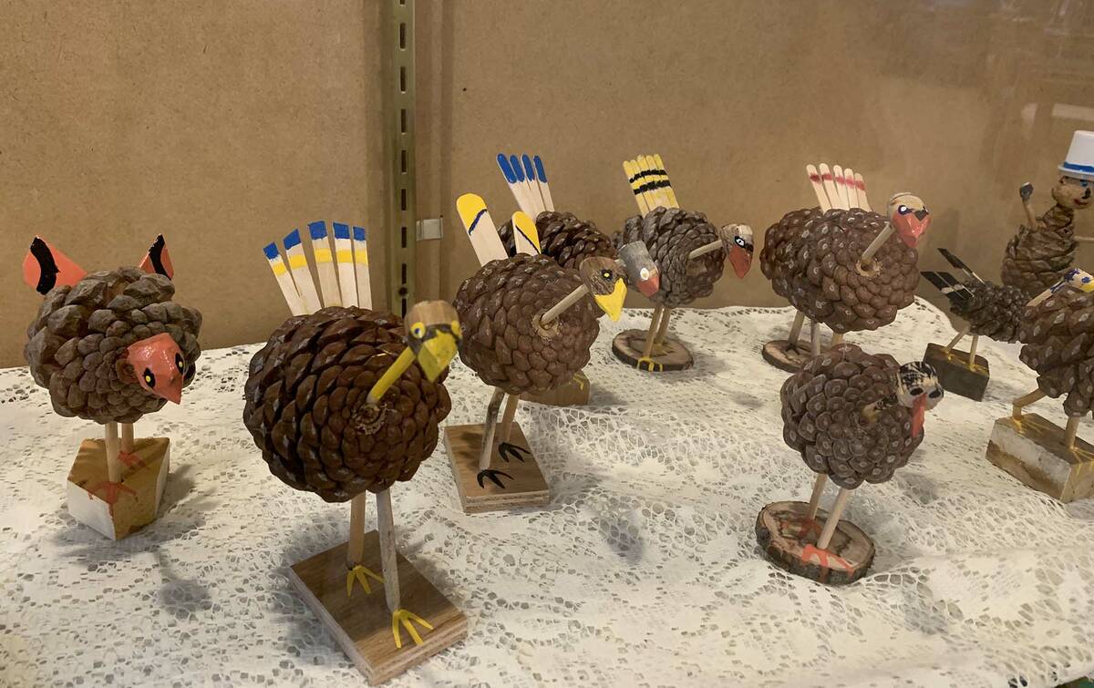 (Hali Bernstein Saylor/Boulder City Review) Several pine cone turkeys made by Jim Amburn of Bou ...