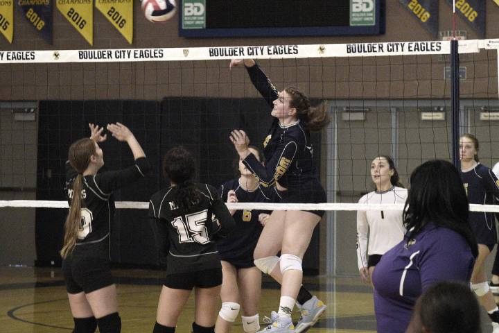 (Boulder City Review file photo) Senior Julianna Luebke, center, was recognized as regional and ...