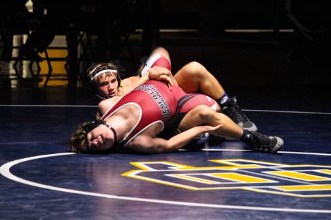 (Courtney Williams/Boulder City Review) Hunter Moore, a senior at Boulder City High School, pin ...
