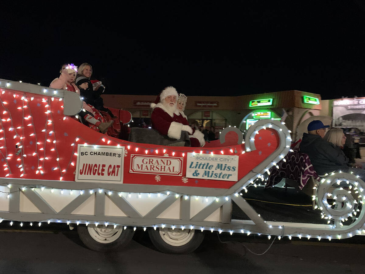 (Hali Bernstein Saylor/Boulder City Review) Santa and Mrs. Claus were accompanied by Grand Mars ...