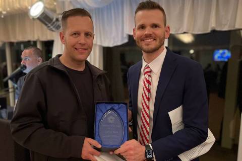 (Photo courtesy Boulder City) Andy Budd, left, is presented with the Employee of the Year award ...