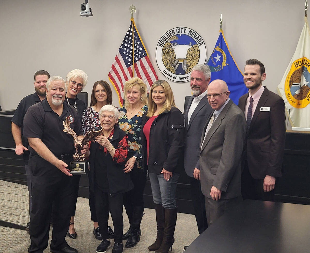 (Mark Credico/Boulder City Review) Roger Hall, front left, was honored for his 45 years of serv ...