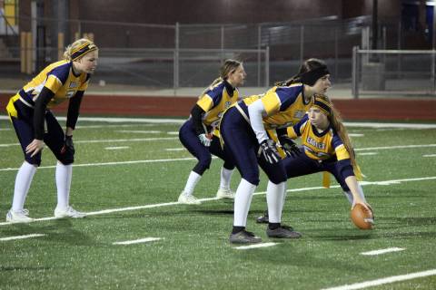 (Courtney Williams/Boulder City Review) Senior Olyvia Thibeault, far right, gets ready to snap ...