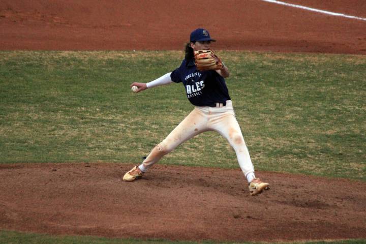 (Courtney Williams/Boulder City Review) Boulder City junior Derek Render pitches the ball durin ...