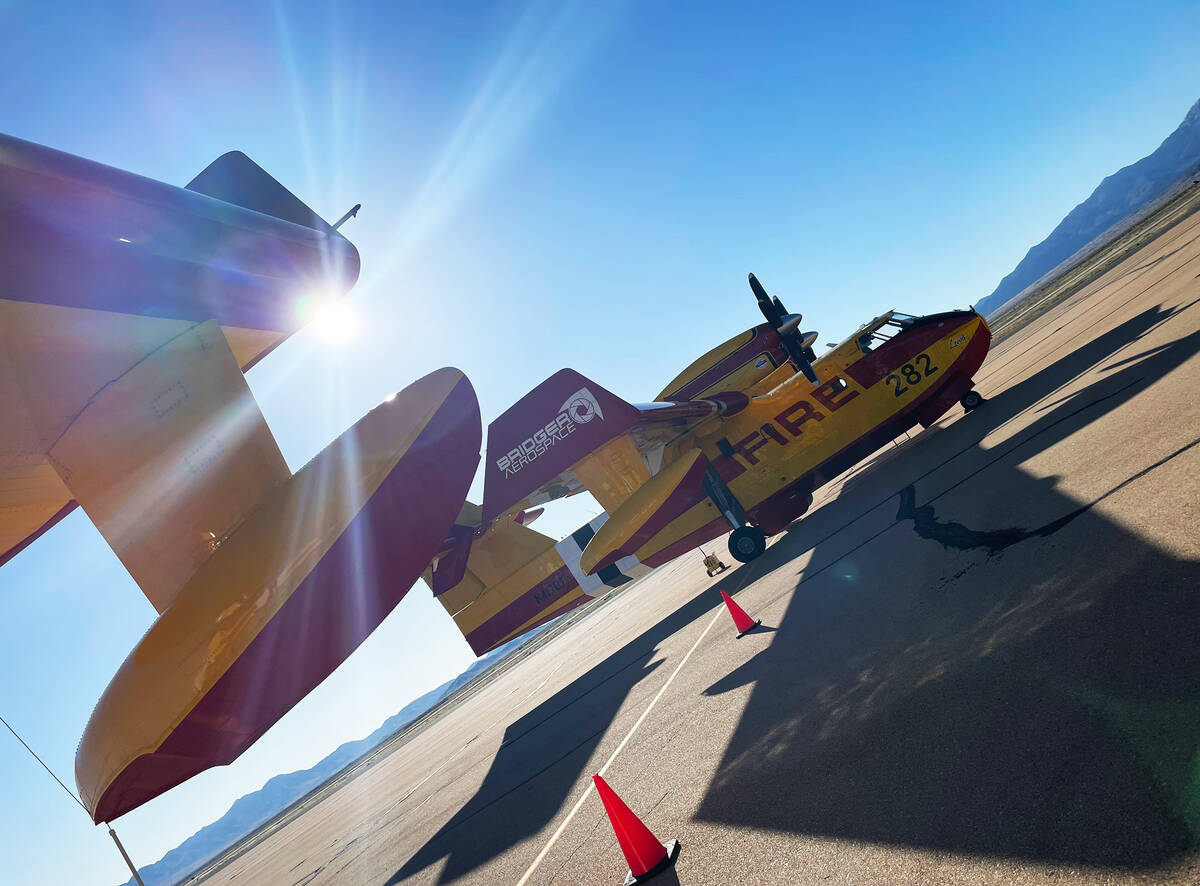 (Bill Evans/Boulder City Review) C-215 Super Scooper planes at the Kingman Airport get ready fo ...