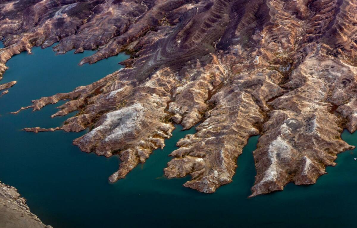 Land is exposed where once was water along the receding Lake Mead shoreline on Monday, March. 6 ...
