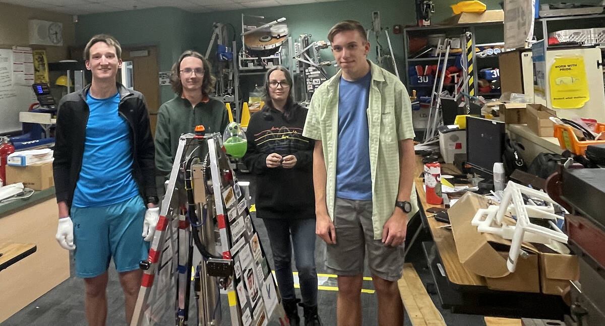 The Boulder City High School Robotics team. From left: Brandon Pickett, Colin Vollmer, Maeli Mc ...