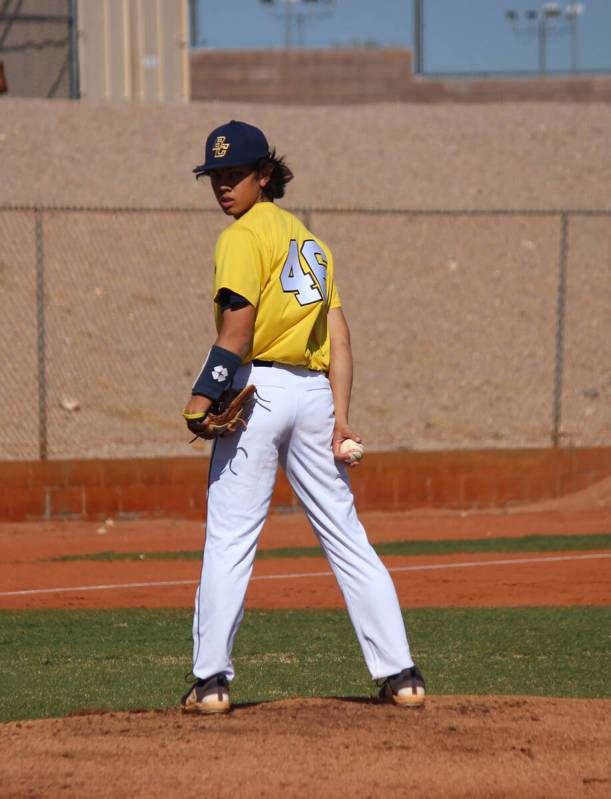 Junior Landon Baker checks first base before a pitch against Sunrise Mountain on March 28, 2023 ...