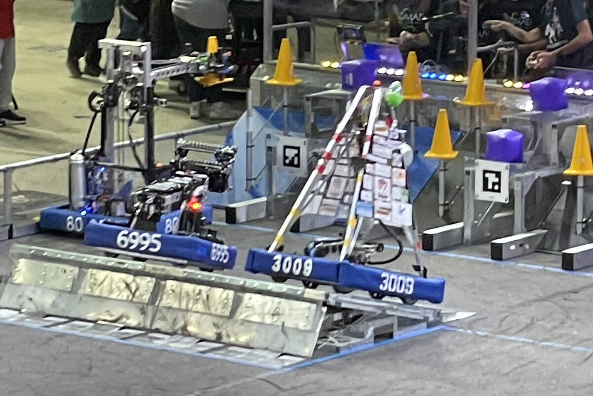 BCHS entry 3009 scales the charging stand at the end of a match. Thomas and Mack Center, March ...