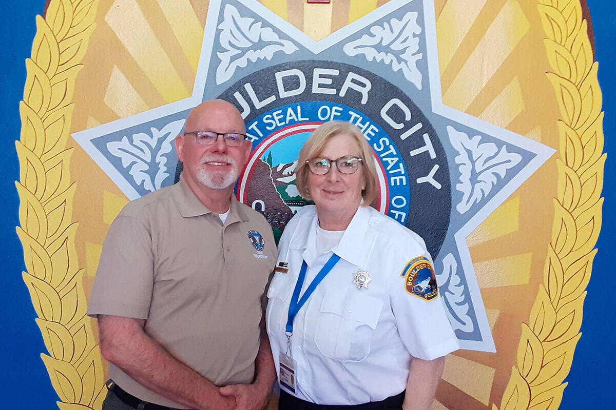 Boulder City Police Department volunteer coordinator Pat Richardson and volunteer Cherie Anders ...