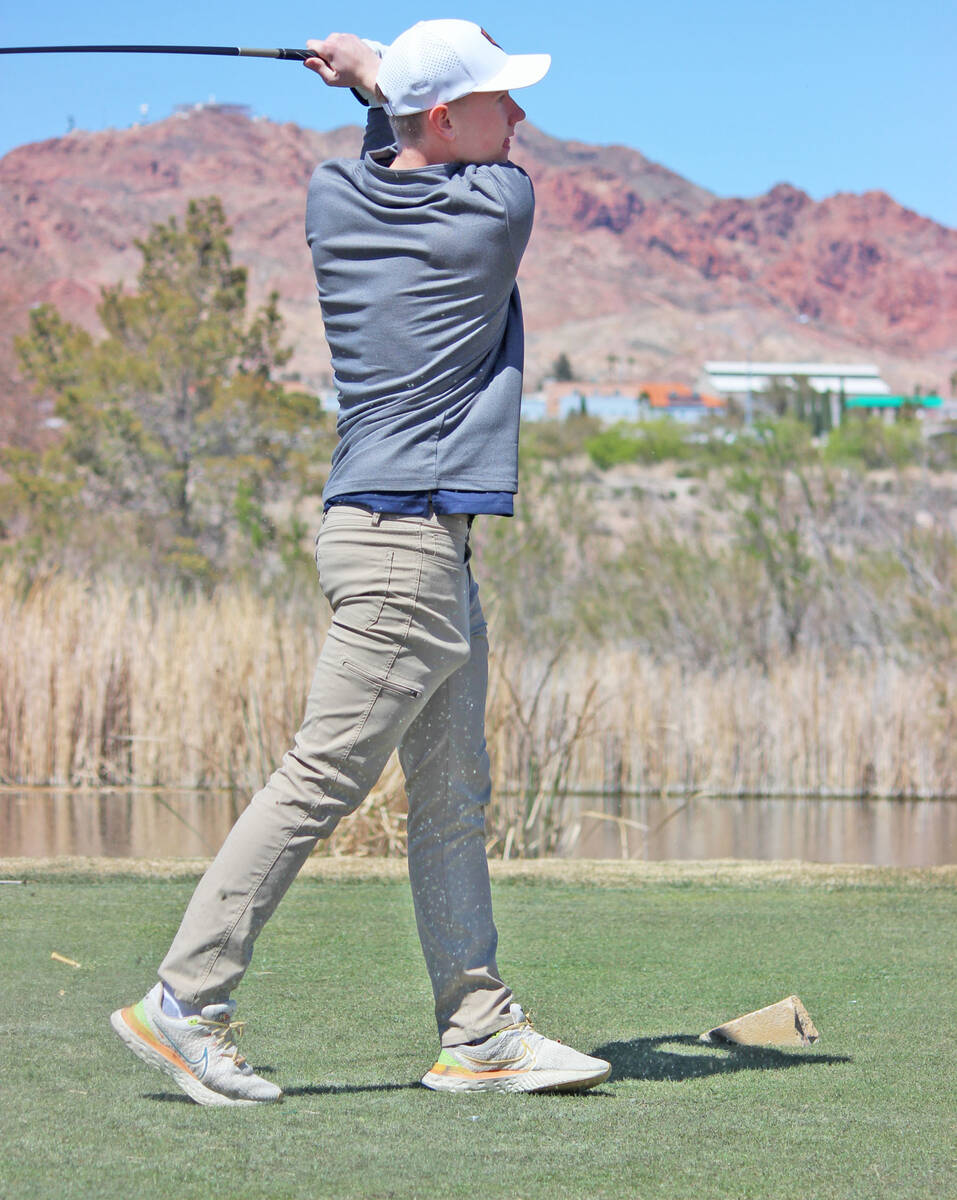 Joshua Miller watches his ball off the tee during action last week at home. (Courtney Williams/ ...