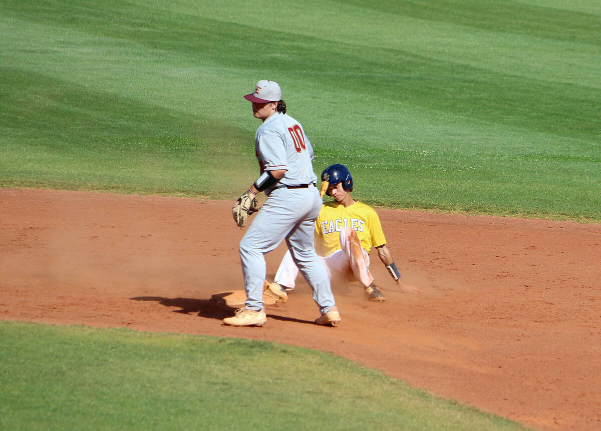 Courtney Williams/Boulder City Review Boulder City's Isaac Gibson slides into second base durin ...