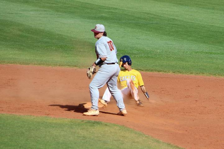 Courtney Williams/Boulder City Review Boulder City's Isaac Gibson slides into second base durin ...