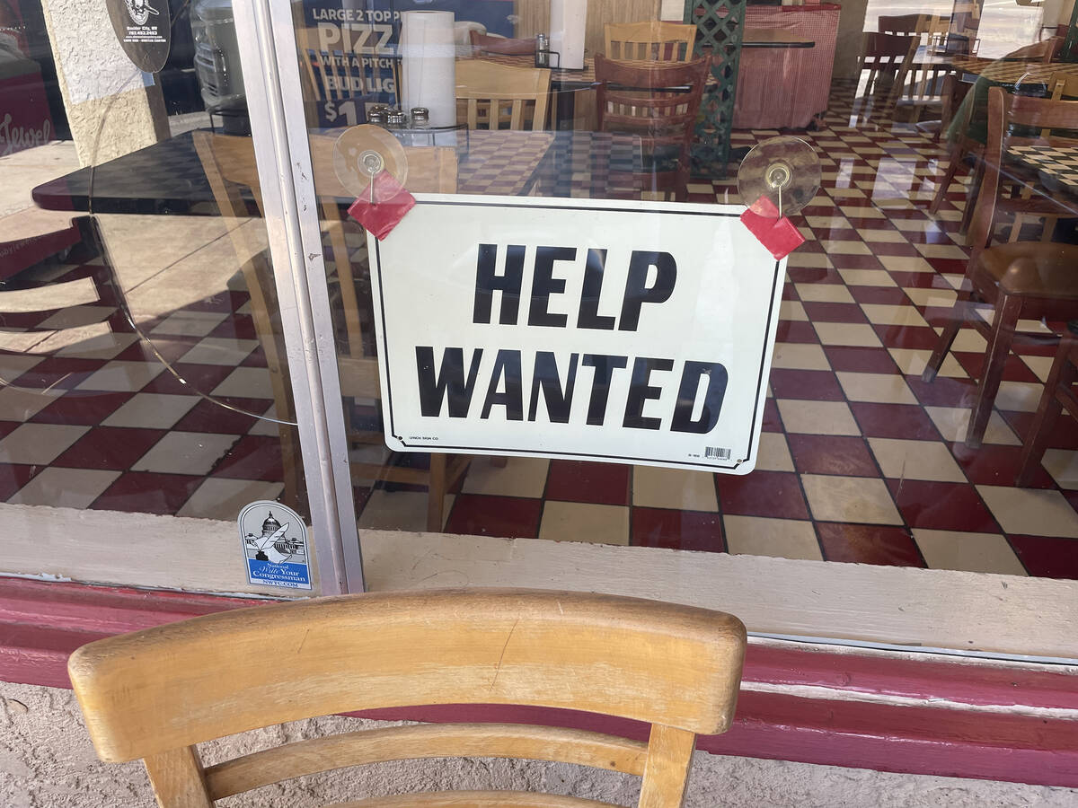(Bill Evans/Boulder City Review) A help wanted sign in the window of Tony's Pizza on Nevada Way ...