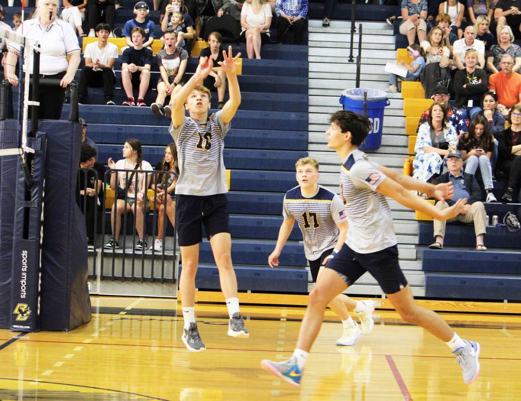 Courtney Williams/Boulder City Review Roman Rose sets the ball during volleyball action earlier ...