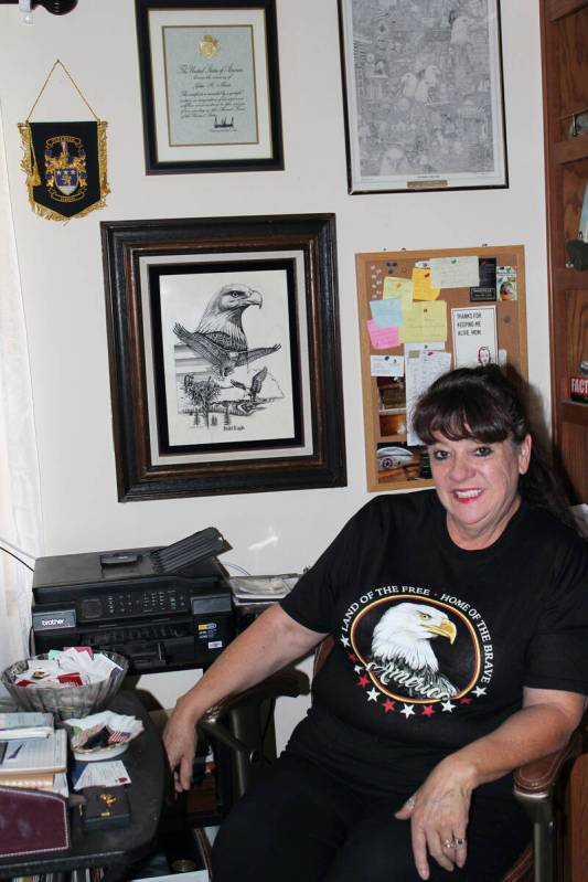 Photo courtesy C.N. Baker Chere’ Pedersen with some of her father’s memorabilia in her Boul ...