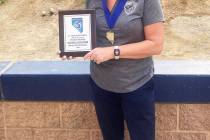 Robert Vendettoli/Boulder City Review Coach Rachelle Huxford with her coach of the year plaque ...
