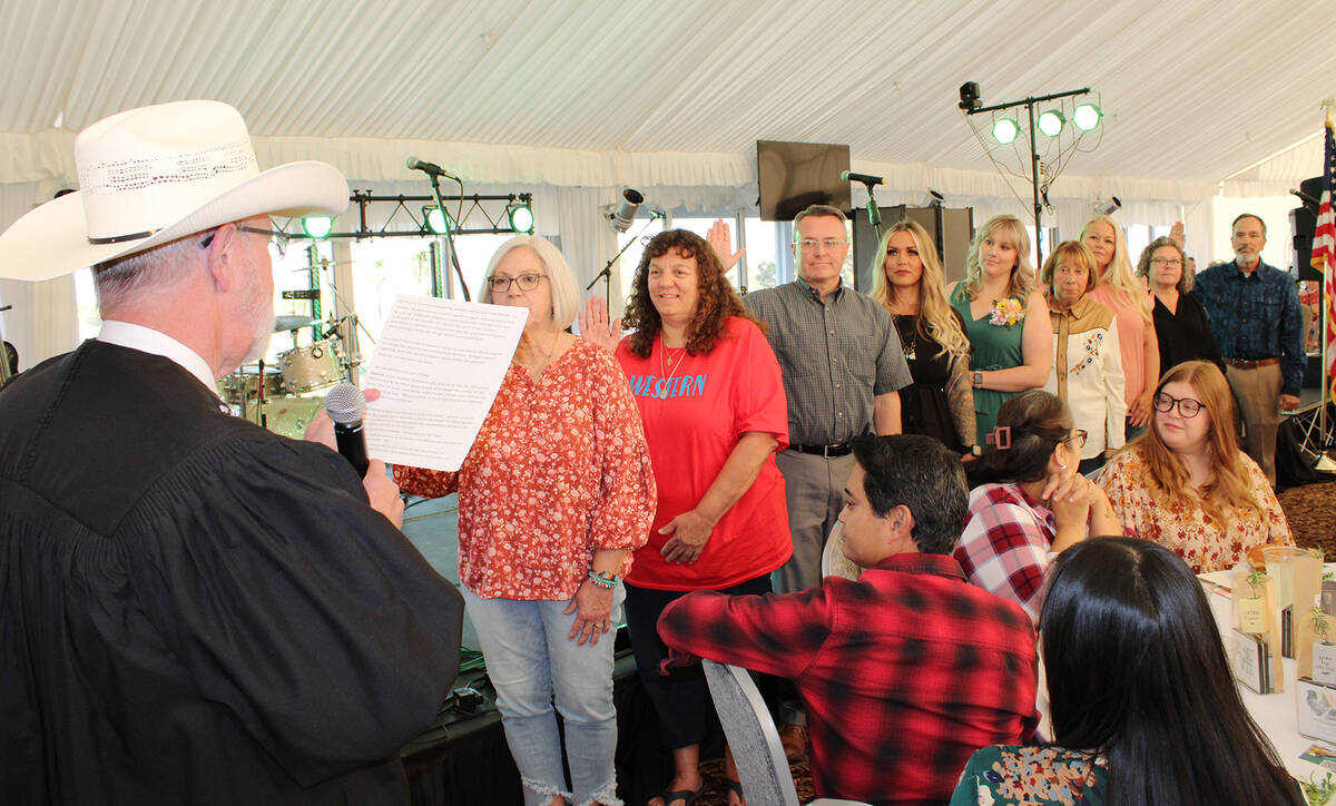 Ron Eland/Boulder City Review Judge Victor Miller swore in the current and new chamber board me ...