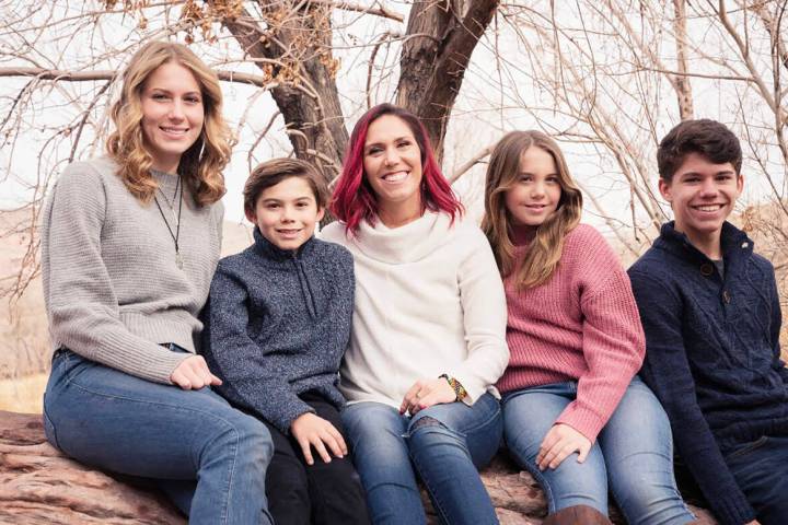 Photo courtesy Sara Farnsworth Sara Farnsworth (center) with her four children, who now range ...