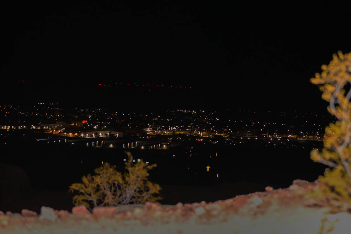 The glow of Boulder City as seen from Bootleg Canyon on Thursday, July 20, 2023. (Daniel Pearso ...