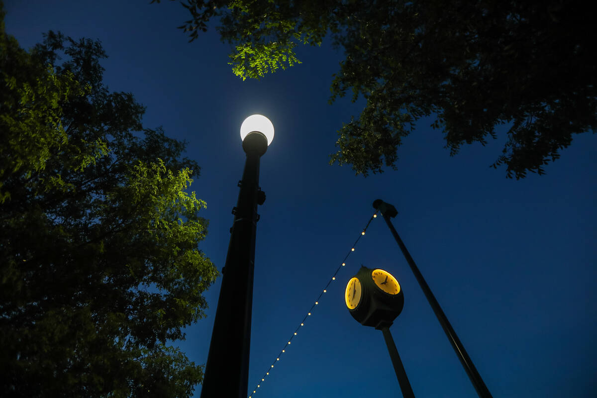 Street lights that are in the process of being retrofitted to give off less luminance and conse ...