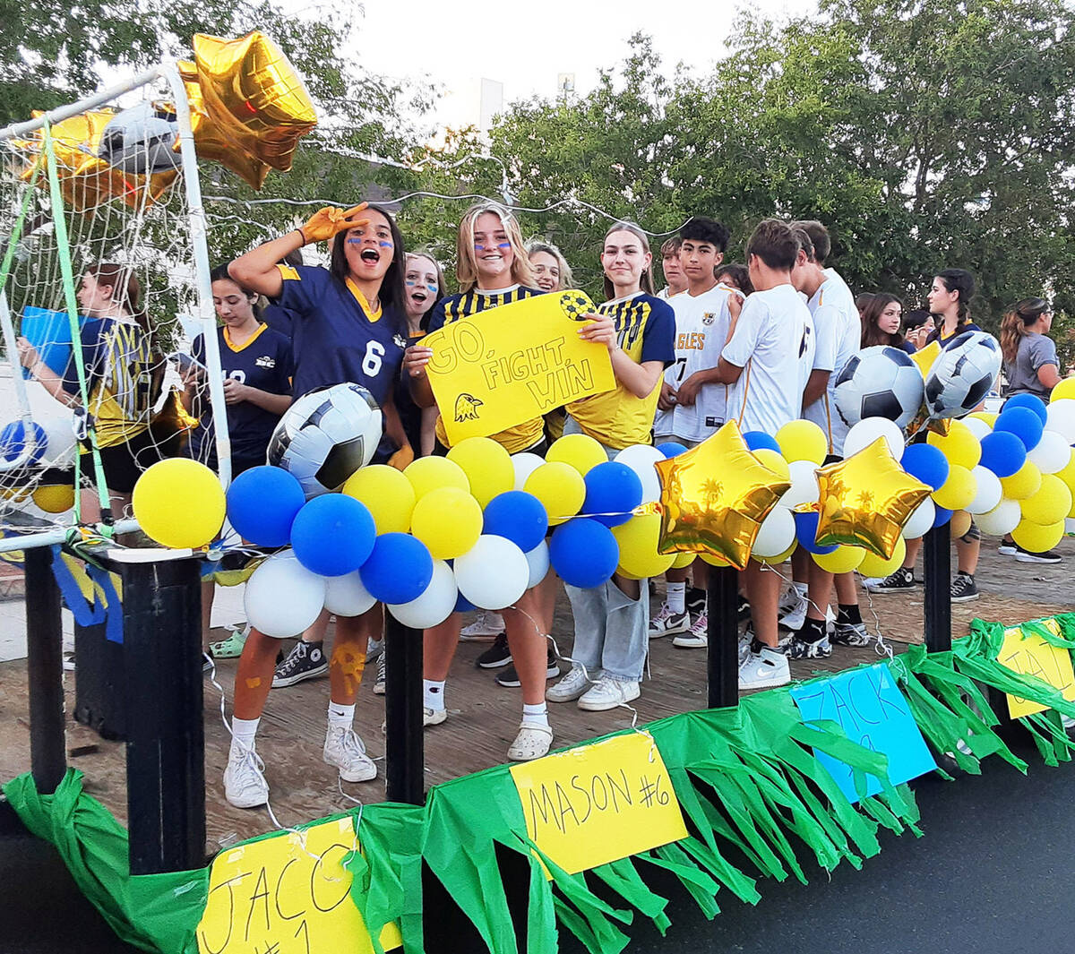 Members of the BCHS boys and girls soccer teams were all smiles during the homecoming parade Fr ...