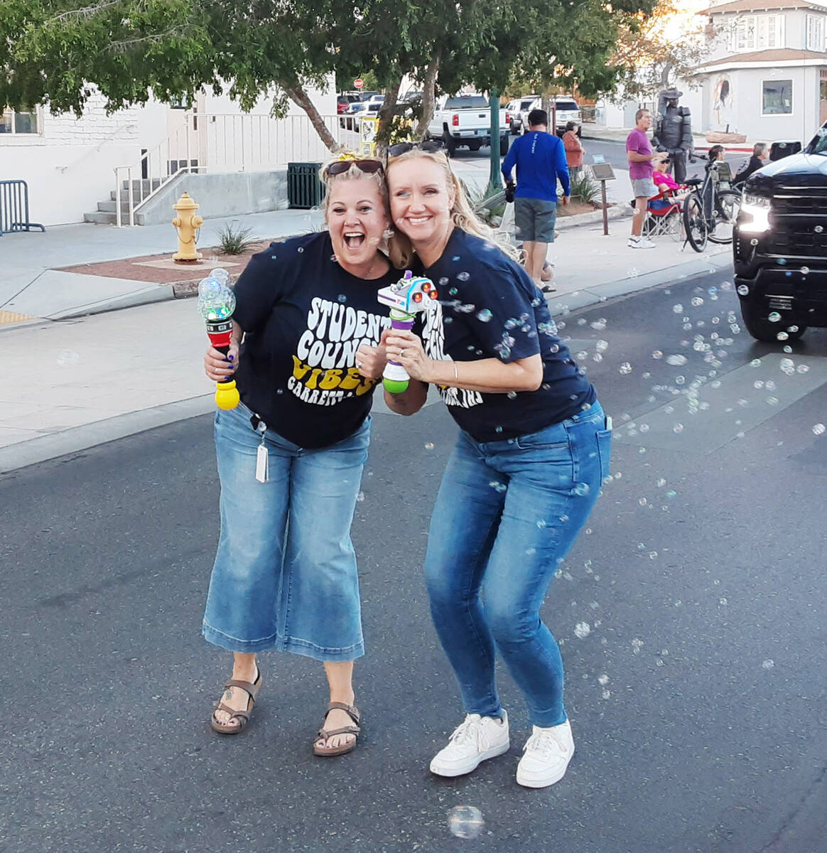Garrett Junior High teachers Christa May (left) and Heather Lawson were all smiles during the p ...
