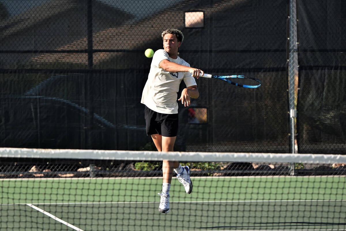 Robert Vendettoli/Boulder City Review Senior Ike Pappas advances the ball back against Liberty ...