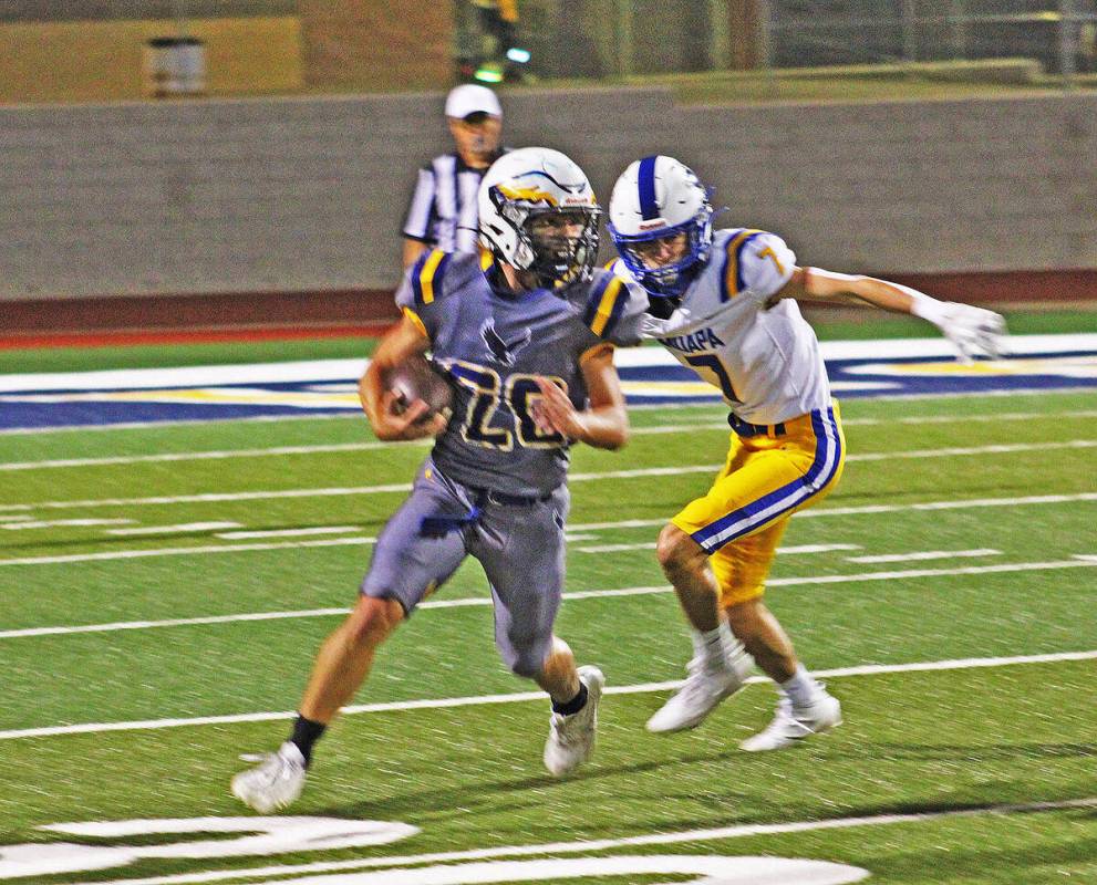 Ron Eland/Boulder City Review Senior Gabriel Richey gets past a Moapa Valley defender during Fr ...