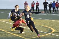 Robert Vendettoli/Boulder City Review Junior quarterback Makayla Nelson rushes up field against ...
