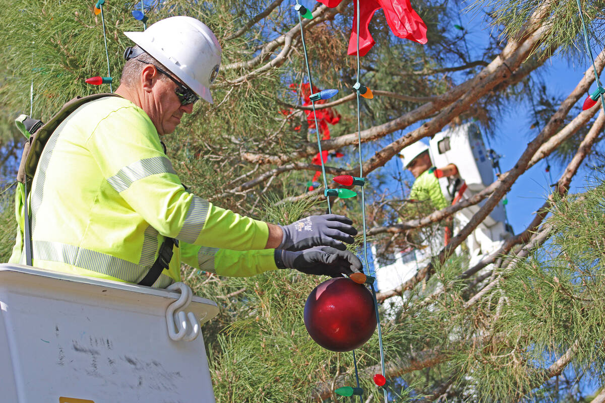 Ron Eland/Boulder City Review Mark Martin, of the city’s public works department, and others ...