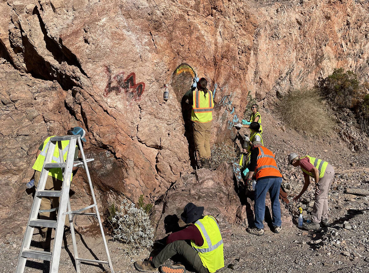 Photos courtesy National Park Service Crews were kept busy earlier this month removing graffiti ...