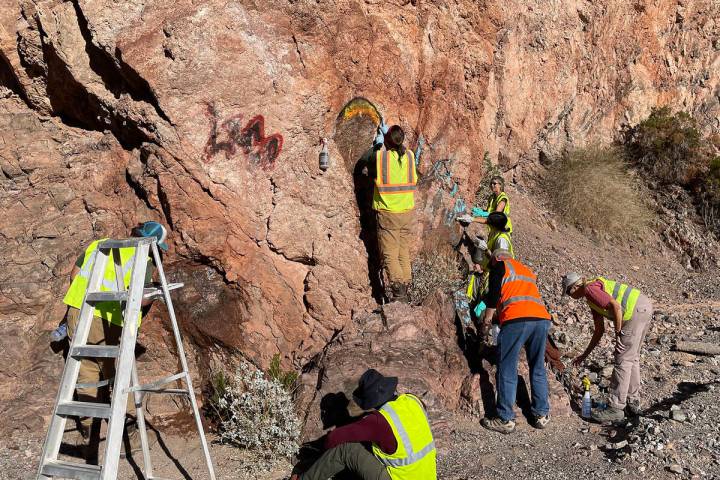 Photos courtesy National Park Service Crews were kept busy earlier this month removing graffiti ...