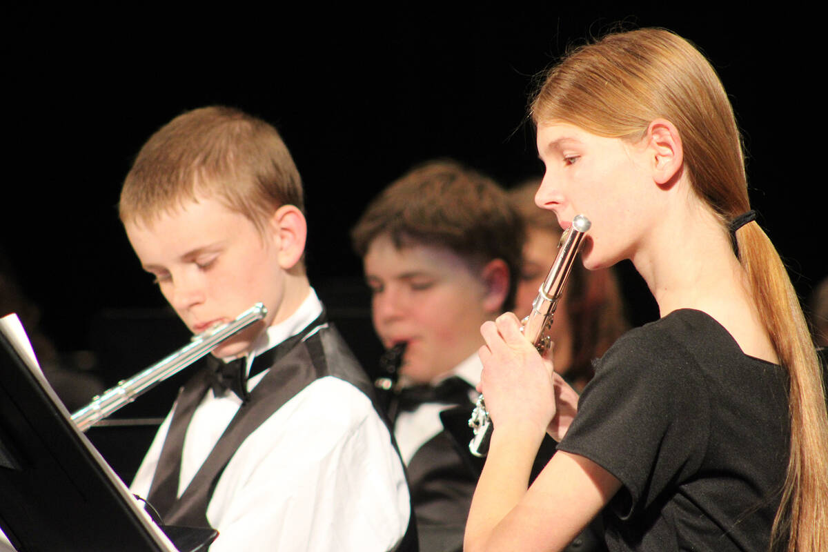 Seth Thompson, Justin Holman and Harmony Cook perform last week before a packed house.