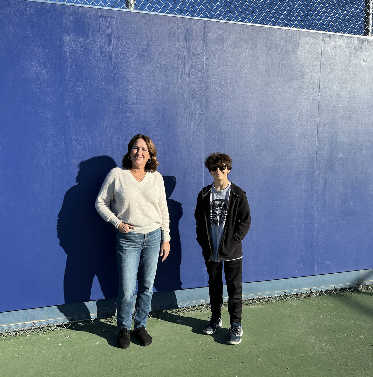 Photo courtesy C.R. Borg Cameron Borg is seen with BCHS tennis coach Rachelle Huxford following ...