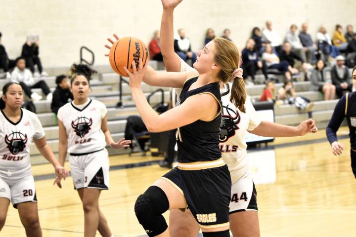 Robert Vendettoli/Boulder City Review Senior Addison Doane goes up for a layup against SLAM Aca ...