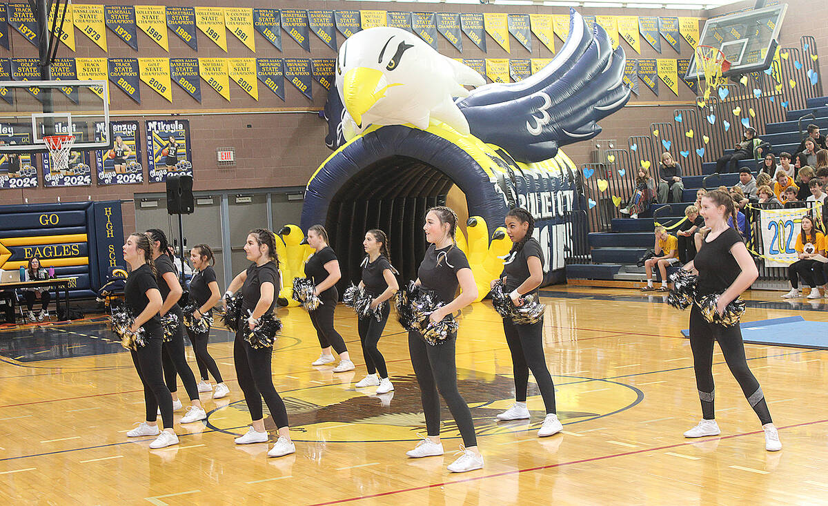 The Boulder City High School cheer team entertained the students Friday.